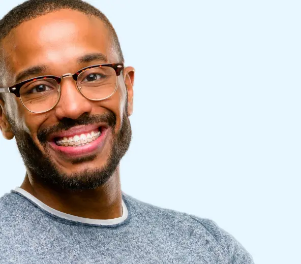 man with glasses smiling